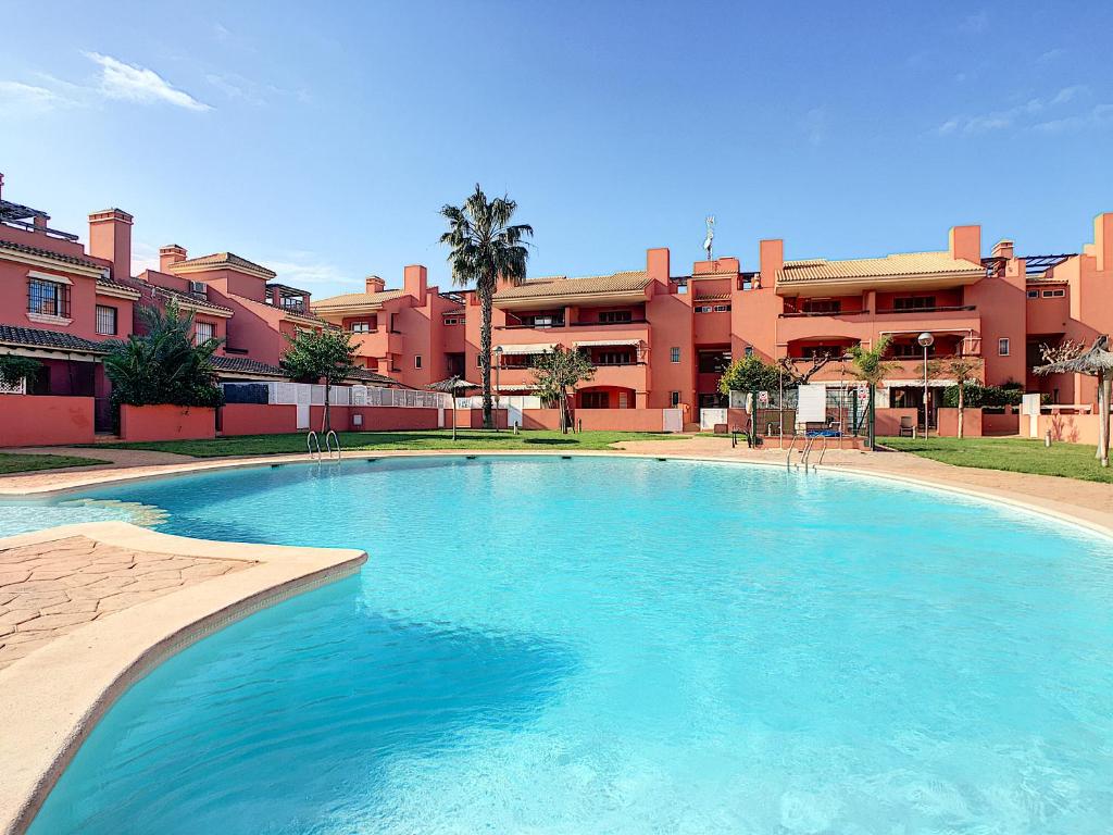 a large swimming pool in front of a building at Albatros Playa 1 - Resort Choice 3507 in Mar de Cristal