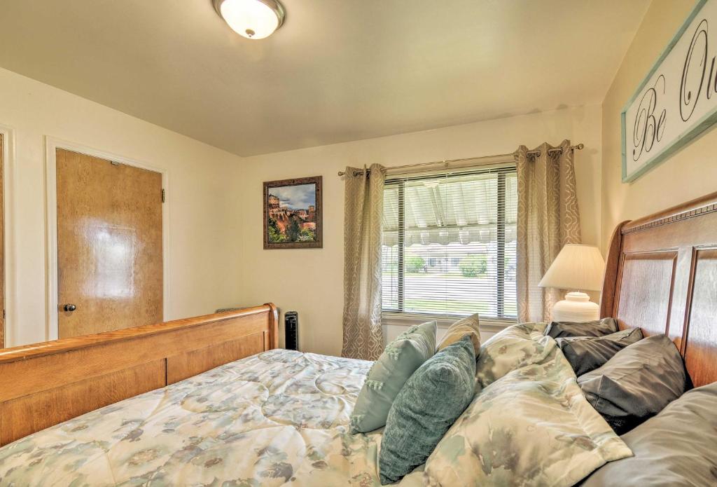 a bedroom with a bed and a window at Panguitch Home with Patio about 24 Mi to Bryce Canyon in Panguitch