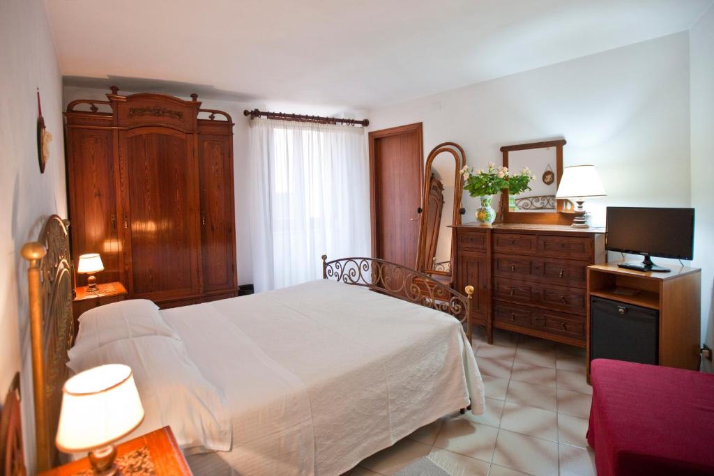 Posteľ alebo postele v izbe v ubytovaní Hotel Moderno