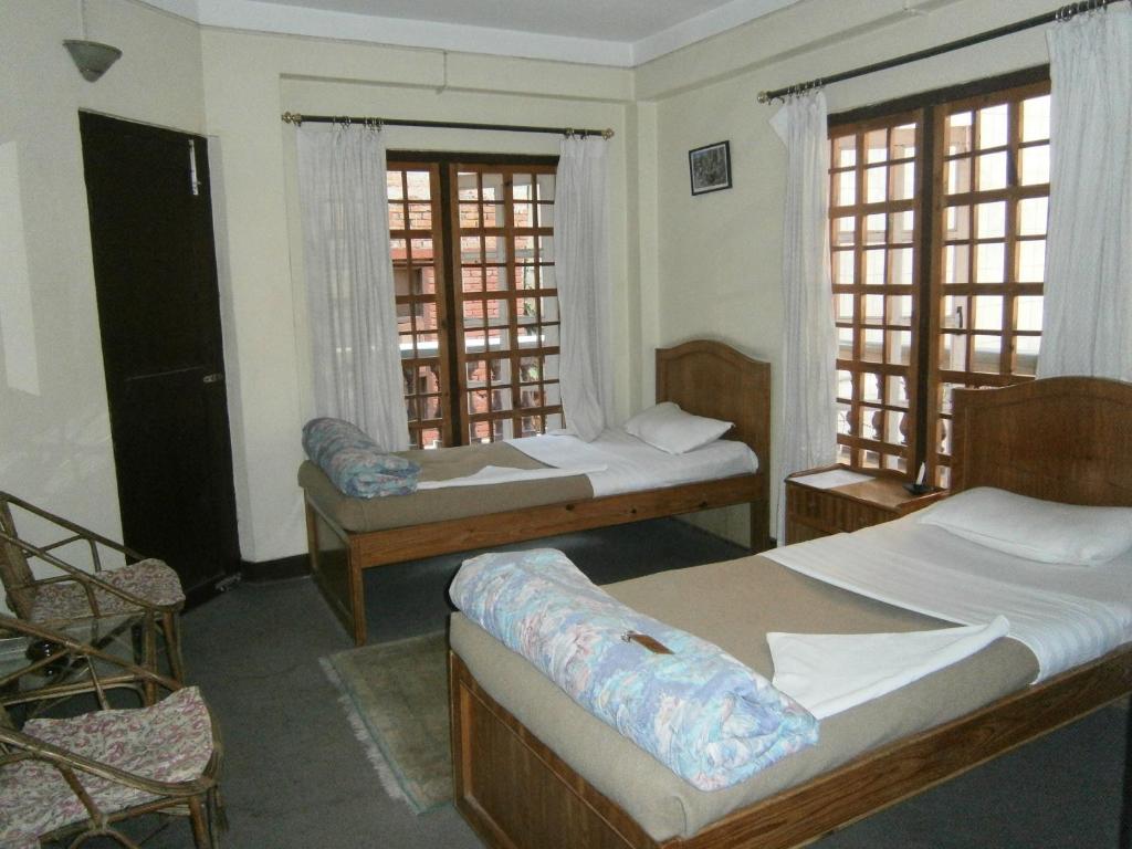 Katil atau katil-katil dalam bilik di Hotel Red Planet