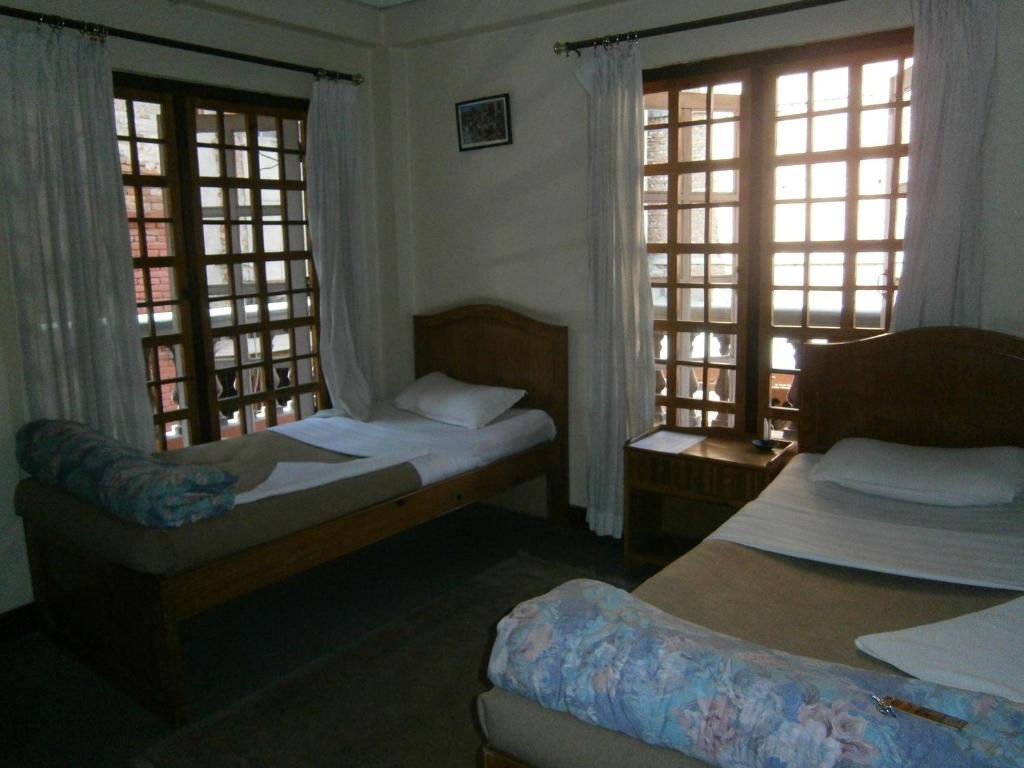 Katil atau katil-katil dalam bilik di Hotel Red Planet