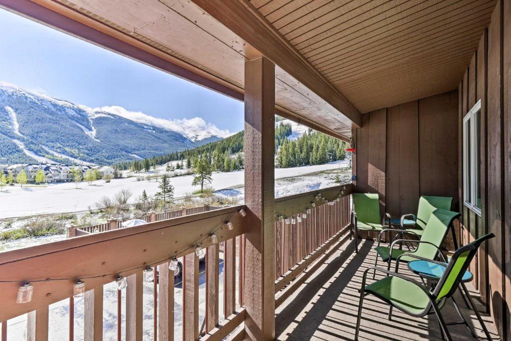 a balcony with chairs and a view of the mountains at Copper Mountain Resort Condo on Golf Course! in Copper Mountain