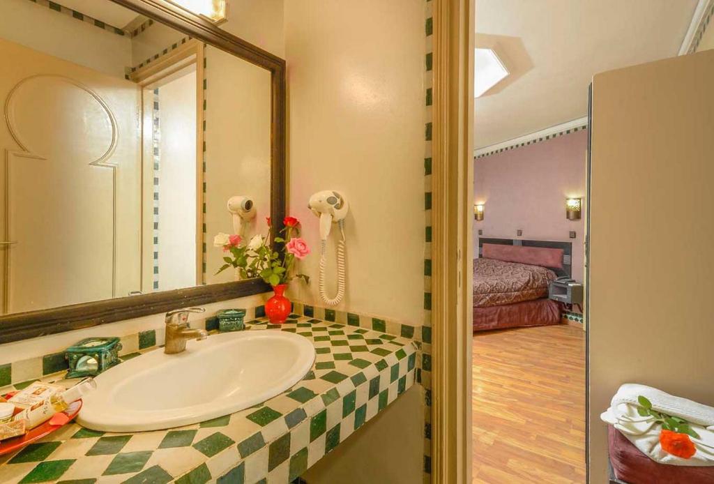 Postel nebo postele na pokoji v ubytování Hotel Islane