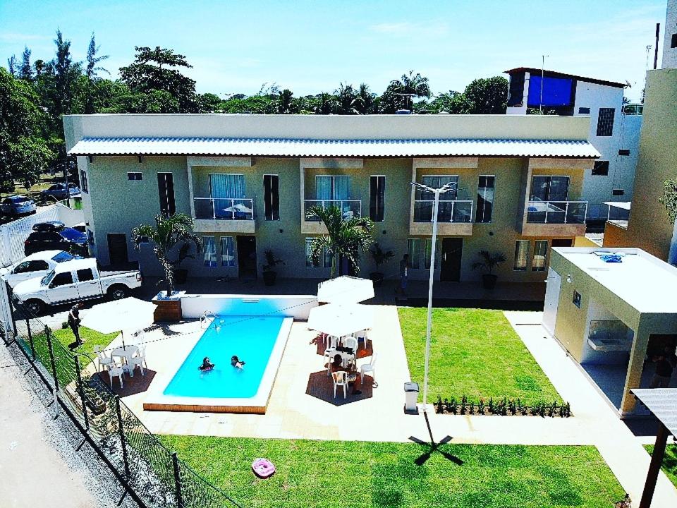 an aerial view of a house with a swimming pool at Golden Apartament's Porto de Galinhas in Porto De Galinhas