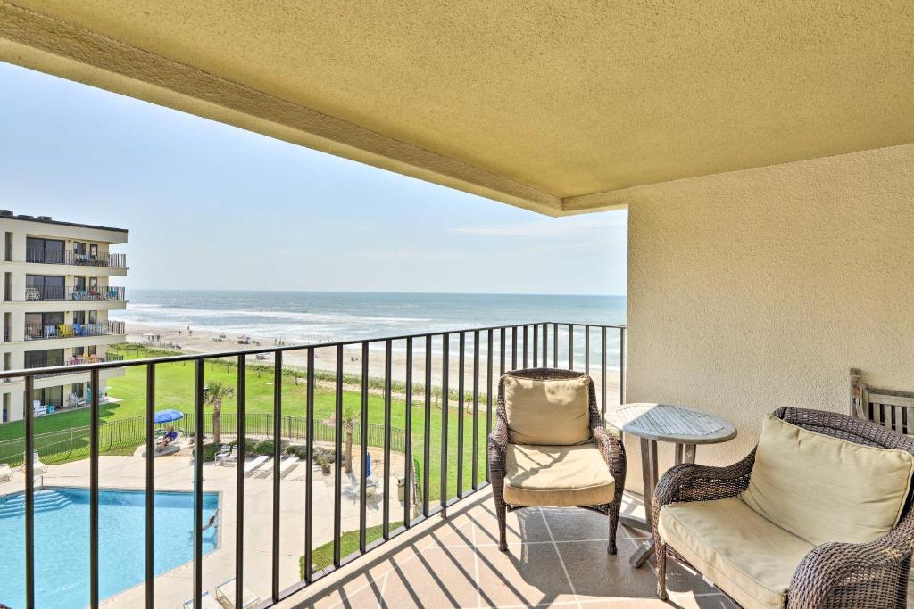 a balcony with chairs and a view of the ocean at Atlantic Beach Resort Condo with Ocean Views! in Atlantic Beach