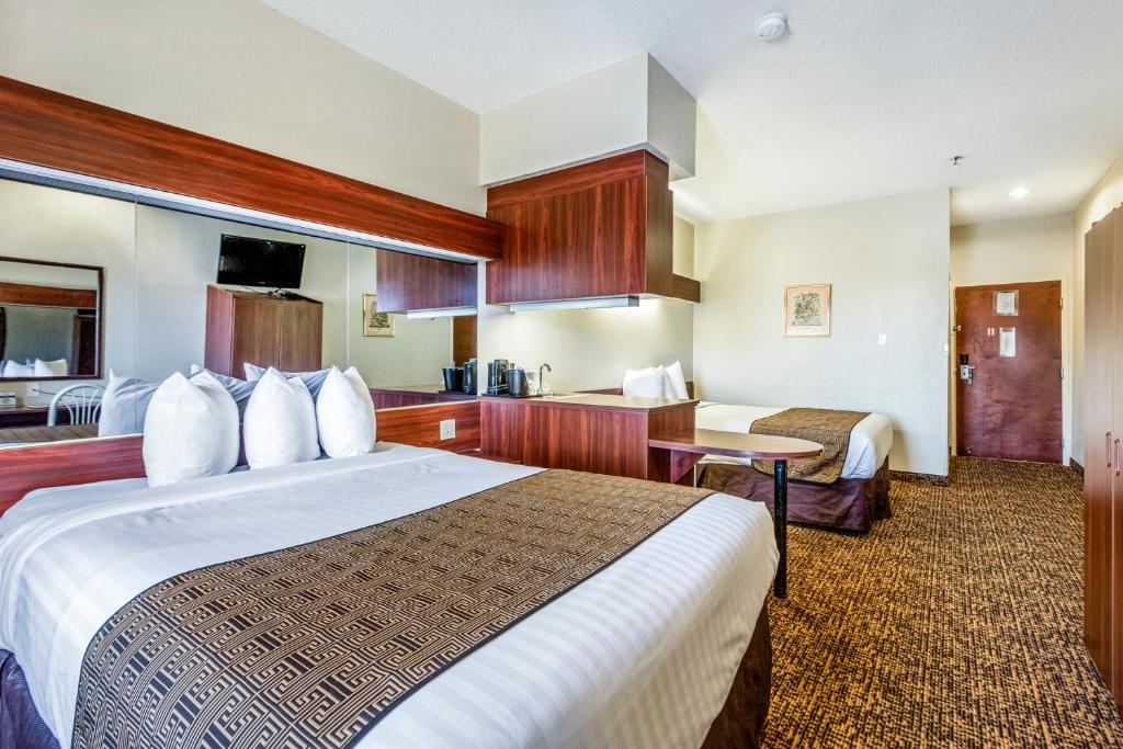 Trident Inn & Suites, Baton Rouge - Lit De Reine Premium 2