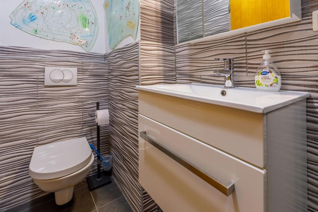 Kúpeľňa v ubytovaní Apartments Frutis