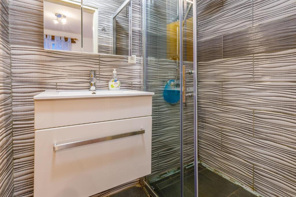 Kúpeľňa v ubytovaní Apartments Frutis