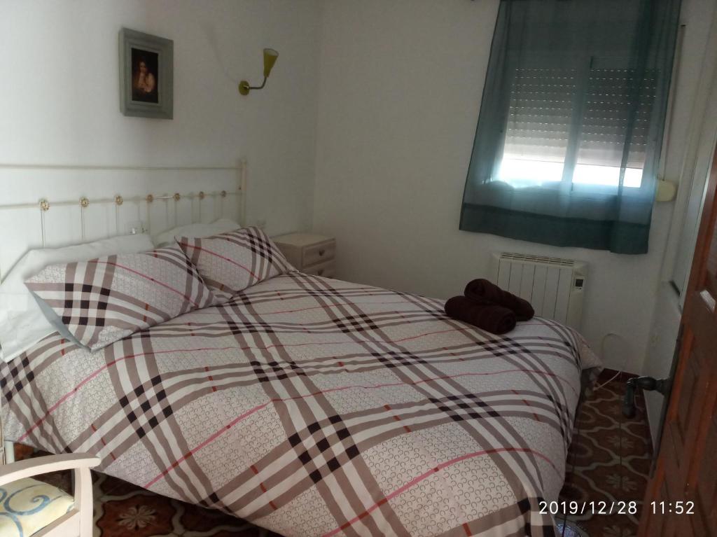 Postel nebo postele na pokoji v ubytování Casa Mayans