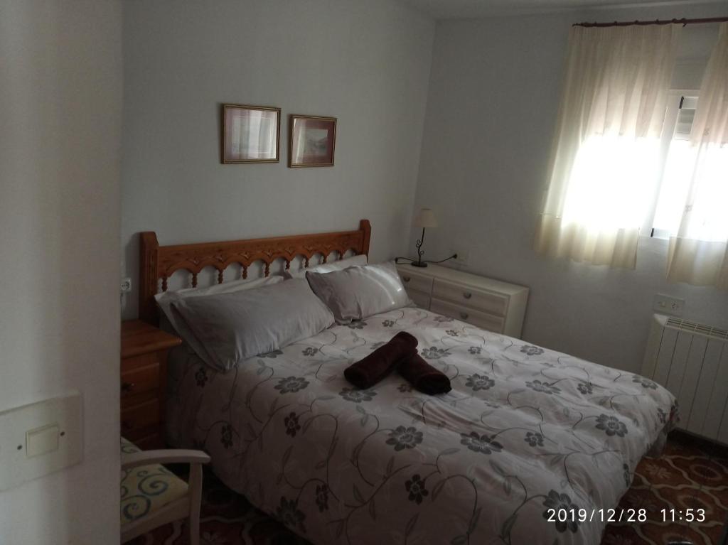 Postel nebo postele na pokoji v ubytování Casa Mayans