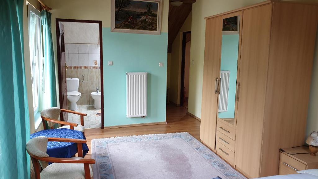 Postel nebo postele na pokoji v ubytování OKW Pilsko
