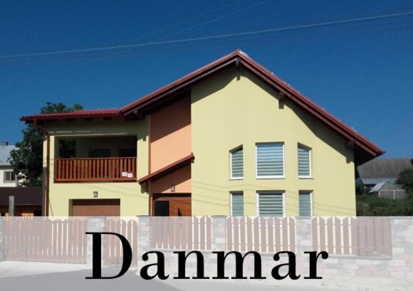 a house behind a fence with the word damned in front of it at Vila Danmar - rent whole vila or upper floor apartment in Závažná Poruba
