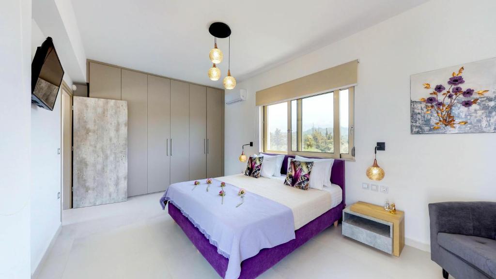Posteľ alebo postele v izbe v ubytovaní Liberty & Freedom Luxury Villas