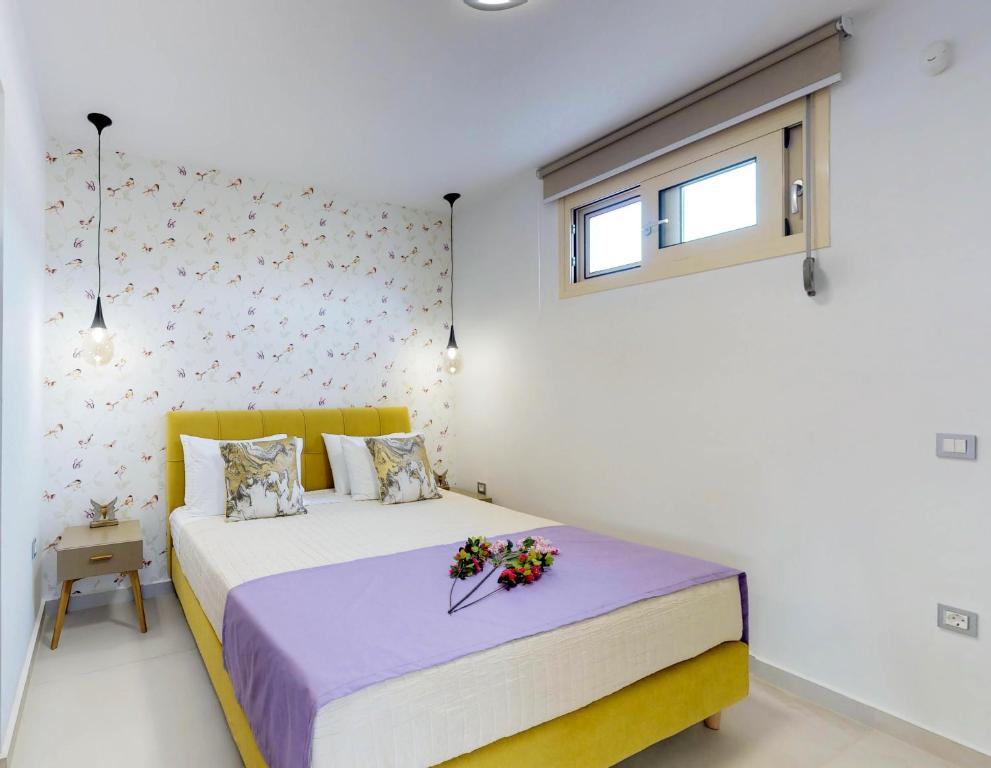 Posteľ alebo postele v izbe v ubytovaní Liberty & Freedom Luxury Villas