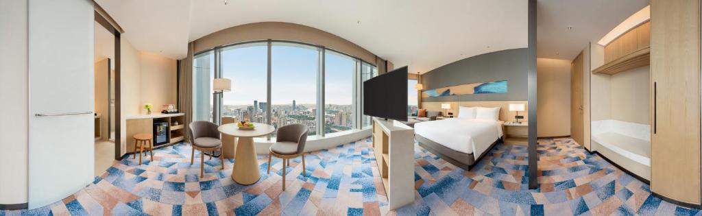 Postel nebo postele na pokoji v ubytování Hyatt Place Liuzhou