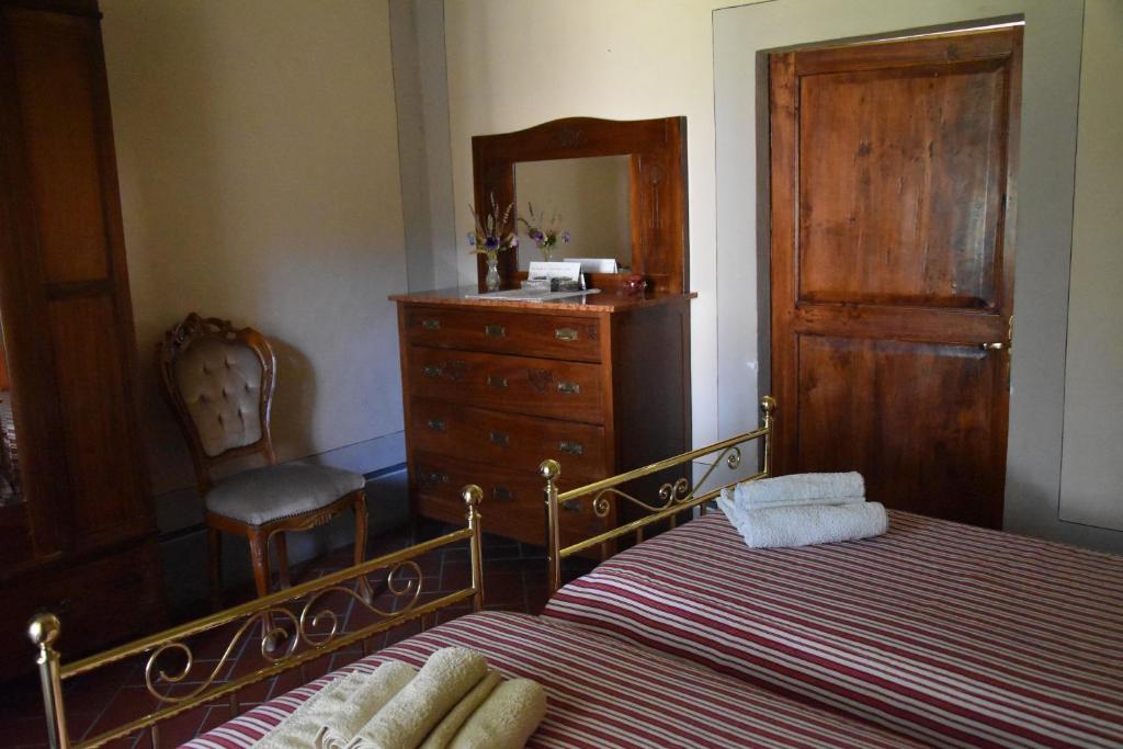 Postel nebo postele na pokoji v ubytování Borgo Vecchio