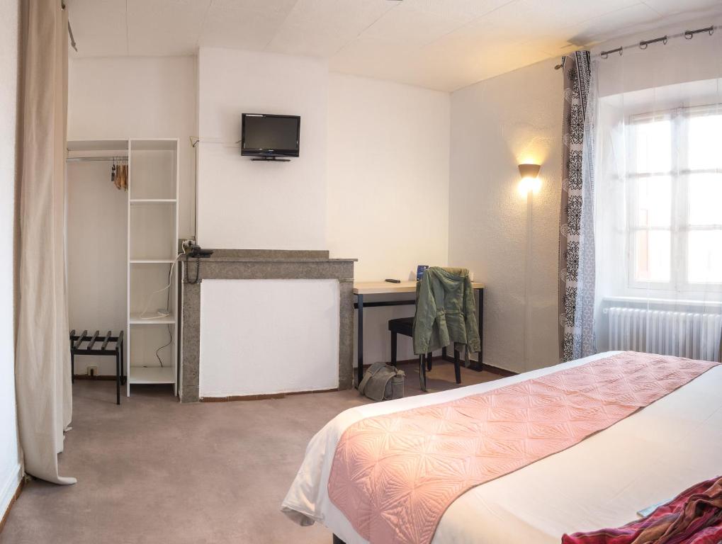 Postel nebo postele na pokoji v ubytování Hotel Astoria