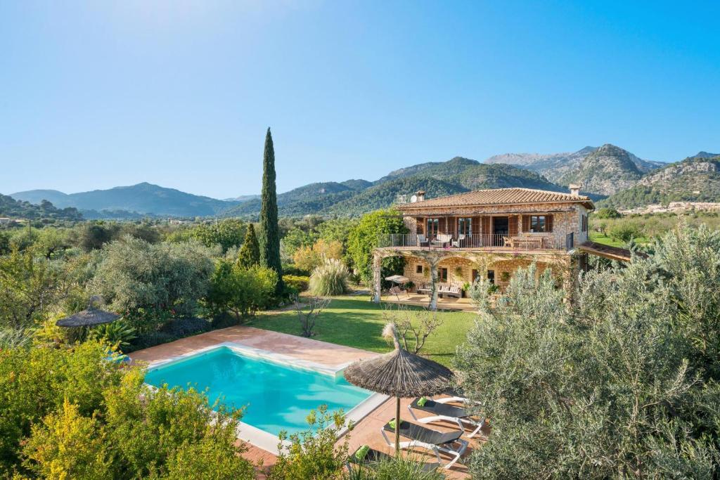 an estate with a swimming pool and a house at Cas Colector in Caimari