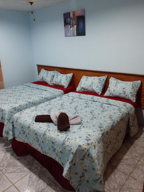 Postel nebo postele na pokoji v ubytování Seaview Hideaway