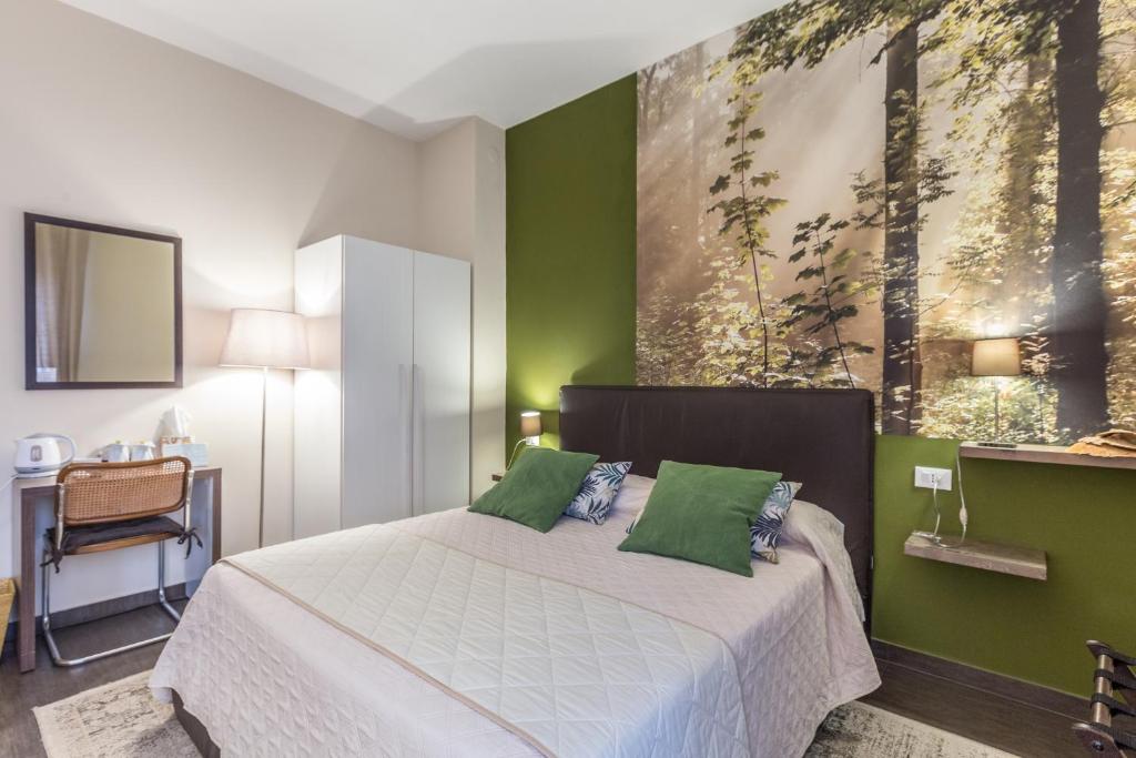 Postel nebo postele na pokoji v ubytování B&b Igea 50