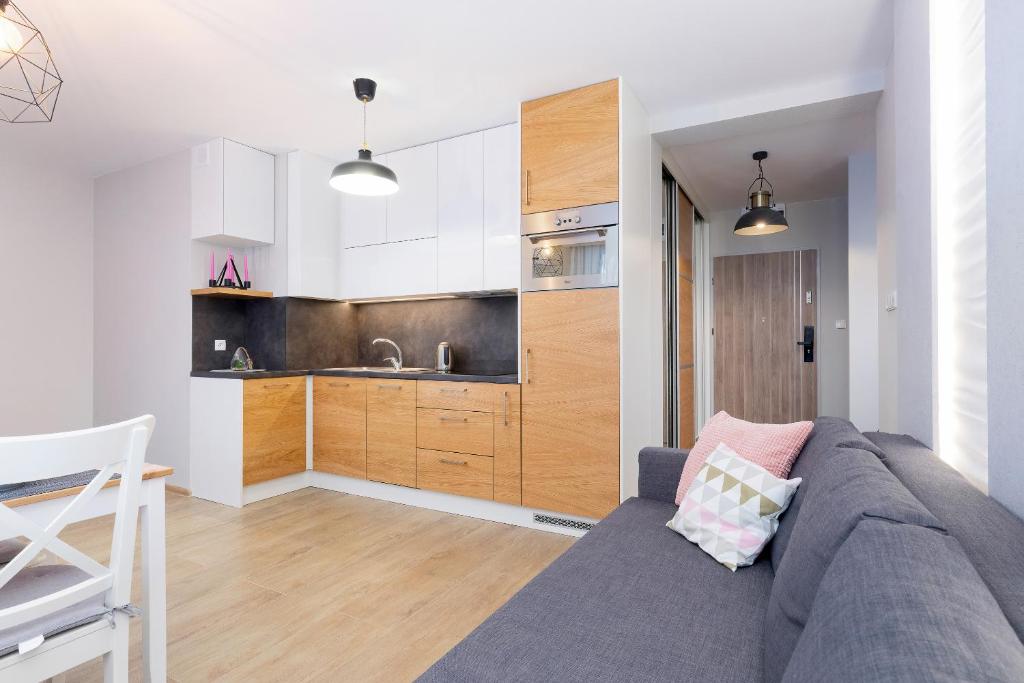 Kuchnia lub aneks kuchenny w obiekcie Apartament Bursztyn II Klifowa
