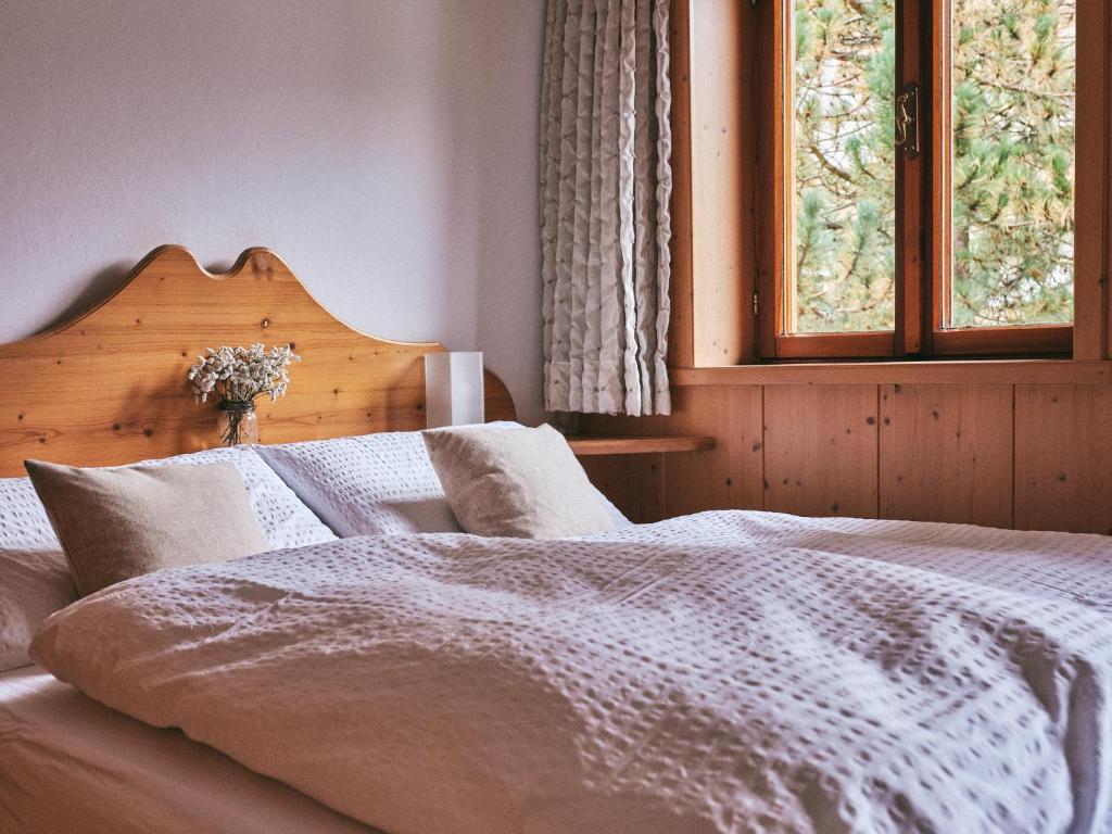 Postel nebo postele na pokoji v ubytování B&B Mia Majon