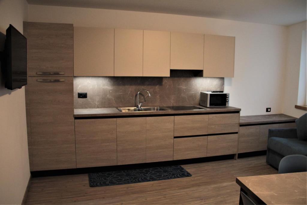 Kuchyň nebo kuchyňský kout v ubytování MOUNTAIN RESORT Appartamenti