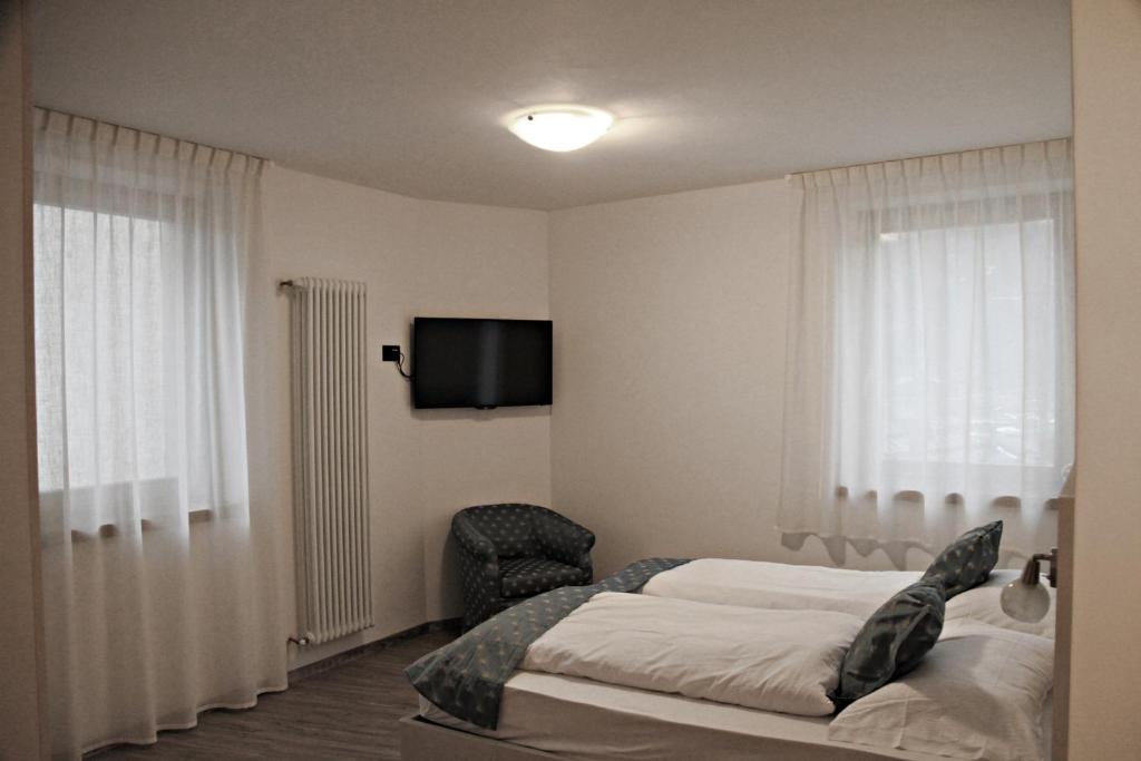 Posteľ alebo postele v izbe v ubytovaní MOUNTAIN RESORT Appartamenti