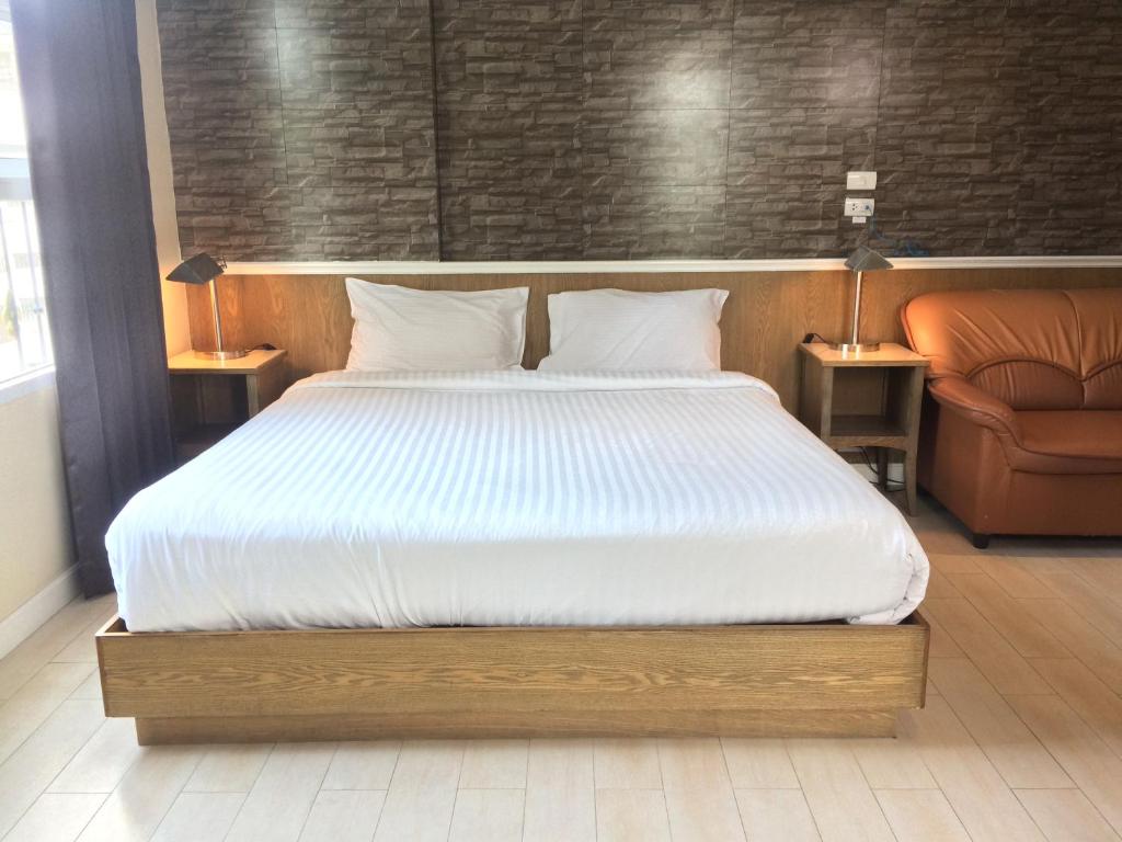 Postel nebo postele na pokoji v ubytování Bourbon St. Boutique Hotel