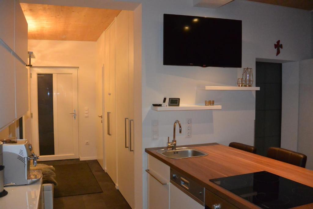 Kuchyň nebo kuchyňský kout v ubytování Mostviertel Lodge