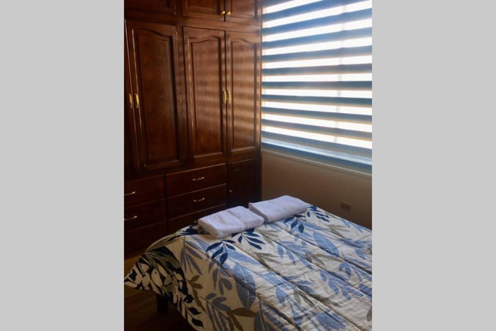 Postel nebo postele na pokoji v ubytování Confortable mini departamento