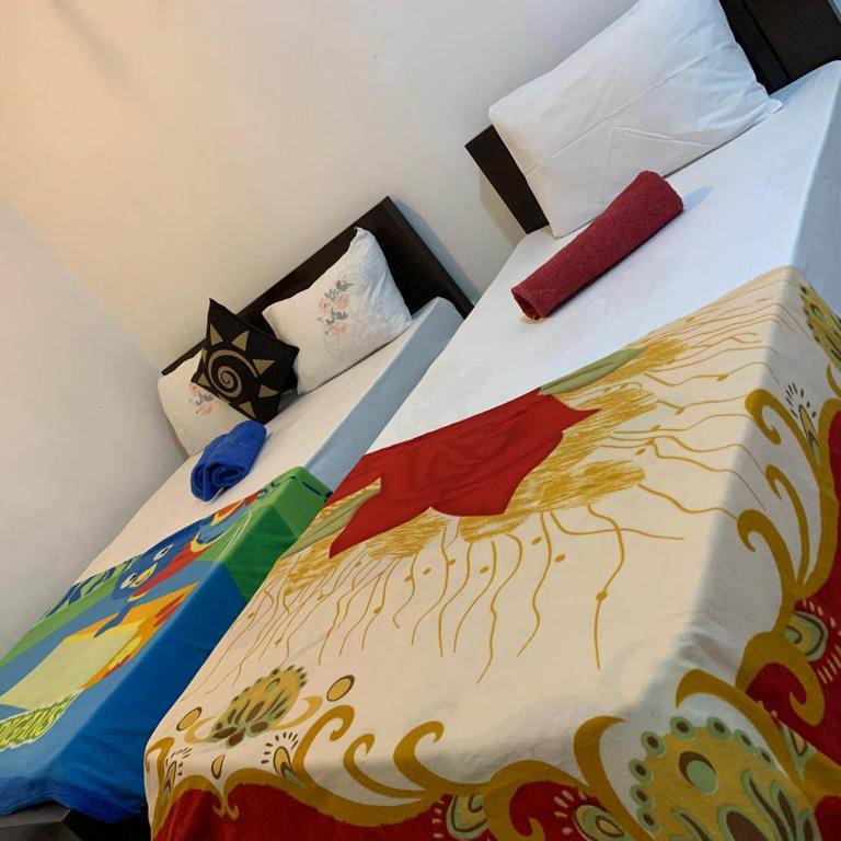Postel nebo postele na pokoji v ubytování Marcelin Family Villa