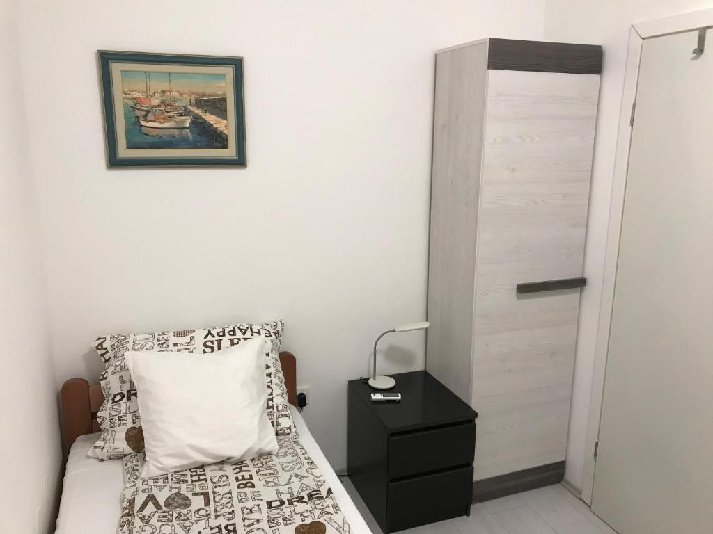 Postel nebo postele na pokoji v ubytování Leptir