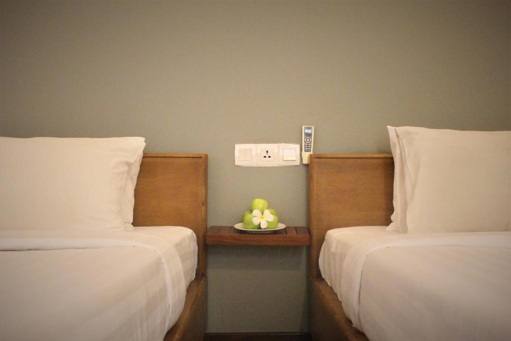 Postel nebo postele na pokoji v ubytování Villa Um Theara, Siem Reap