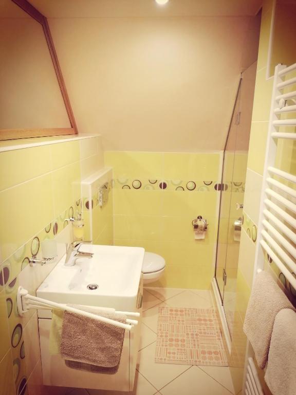 Kúpeľňa v ubytovaní Mezonetový apartmán