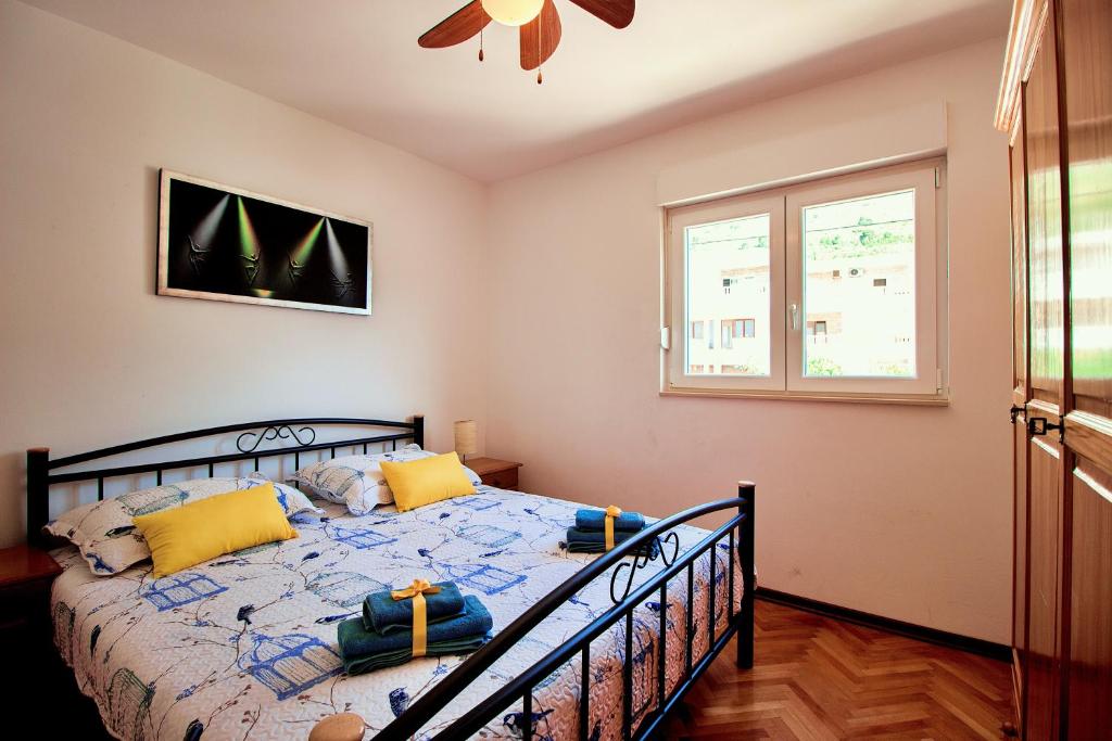 Postel nebo postele na pokoji v ubytování Sandy Beach Apartments