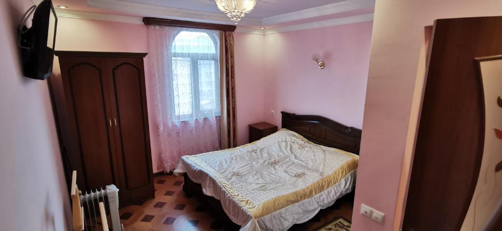 Postel nebo postele na pokoji v ubytování Hotel Halidzor