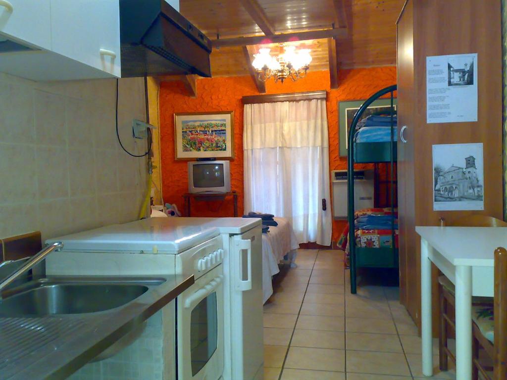 a kitchen with a sink and a counter top at Ianua Coeli 2 in Mosso Santa Maria
