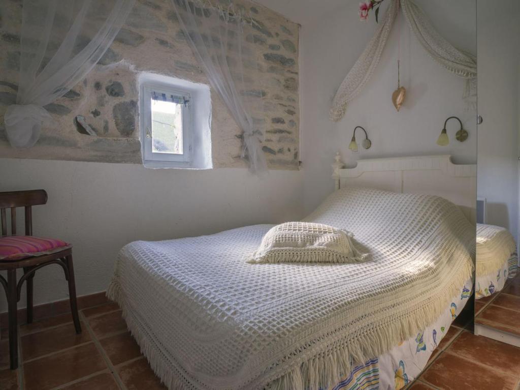 Postel nebo postele na pokoji v ubytování Petit Château