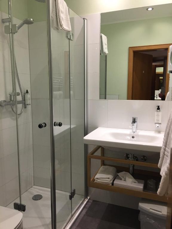 Koupelna v ubytování Hotel Hesborner Kuckuck