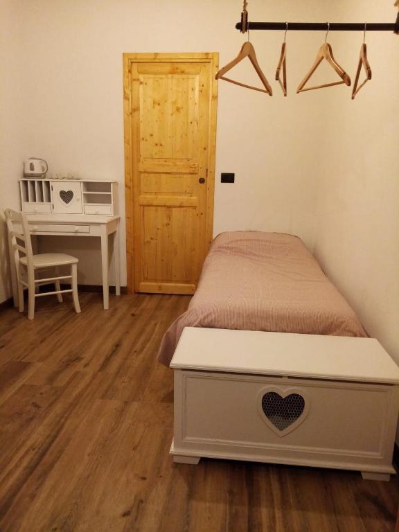 Postel nebo postele na pokoji v ubytování Cascina Bucolica B&B