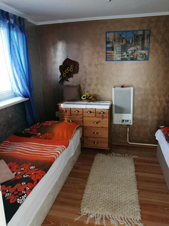 Posteľ alebo postele v izbe v ubytovaní Chata ALBA REGIA