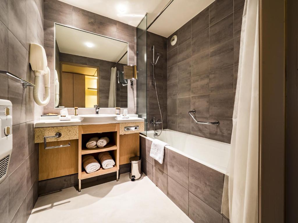Koupelna v ubytování Hôtel Le Pré Carré