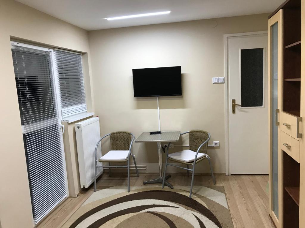 A television and/or entertainment centre at Harsányi vendégház