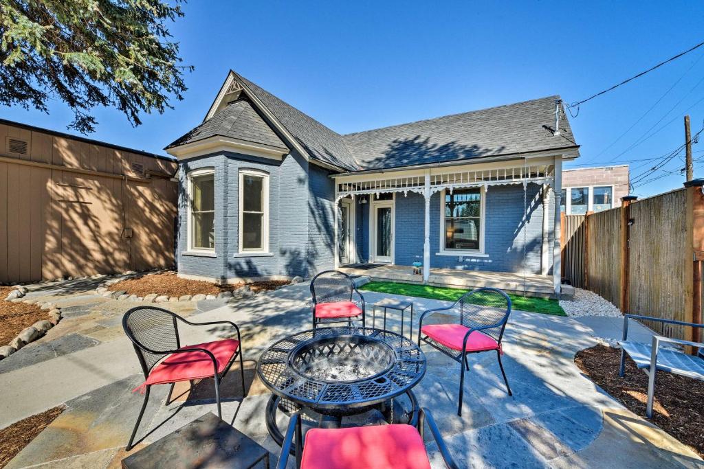 a patio with a table and chairs in front of a house at Downtown Salida Home, 1 Block to Main Street, 0547 in Salida