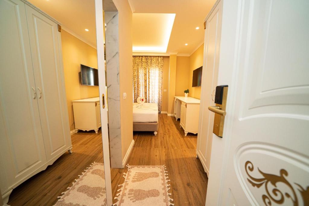 Postel nebo postele na pokoji v ubytování Hotel Vila Mare