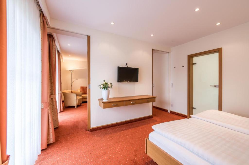 Postel nebo postele na pokoji v ubytování Hotel Hanses-Bräutigam