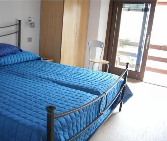 Postel nebo postele na pokoji v ubytování B&B Gardumo