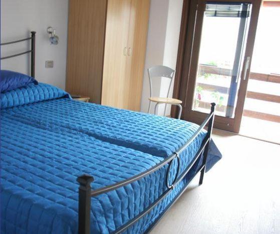 Postel nebo postele na pokoji v ubytování B&B Gardumo