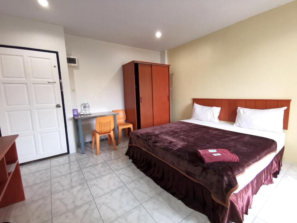 Postel nebo postele na pokoji v ubytování Ban Kaew Guesthouse Songkhla